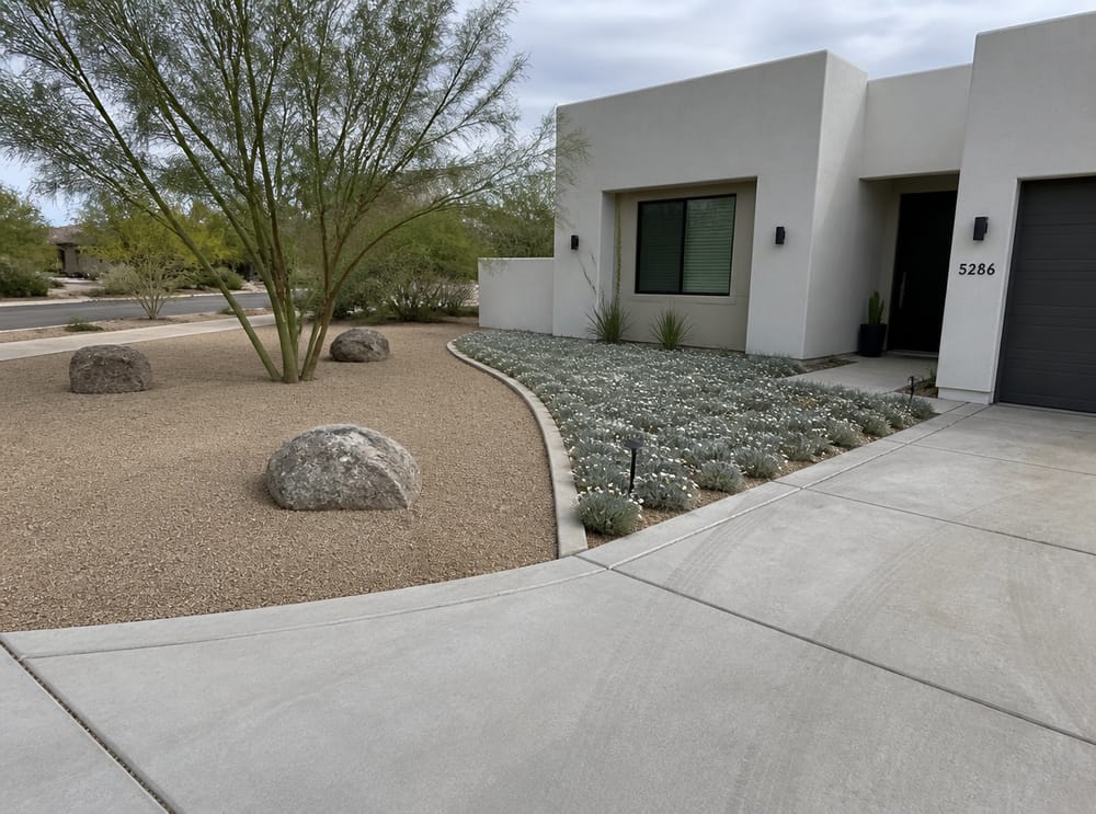 Two-zone front yard with boulders and ground cover