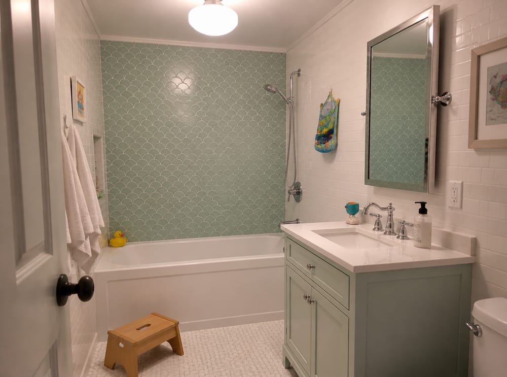 Mint scallop tiles on bathtub back wall