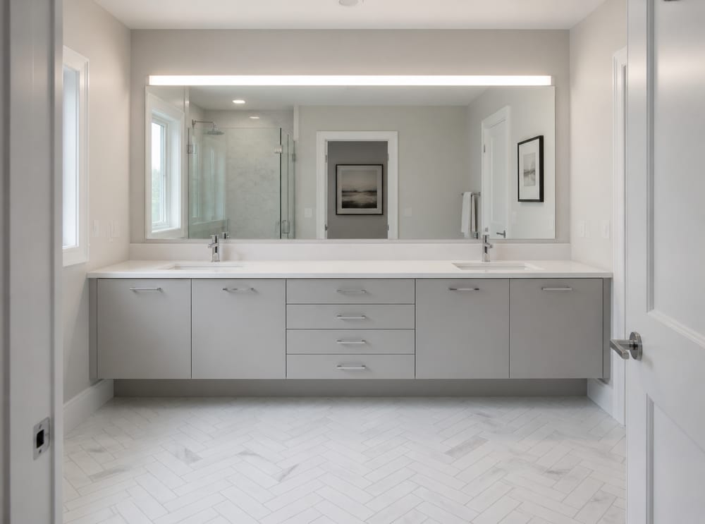 Floating grey lacquer double vanity, clear countertop