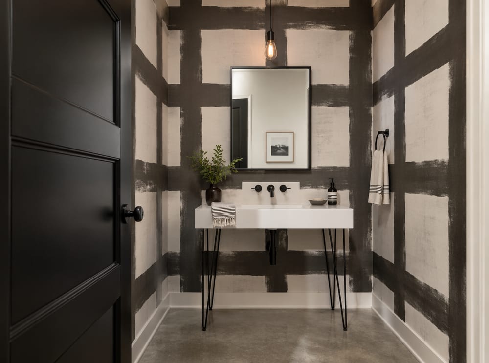 Oversized charcoal grid on all four walls