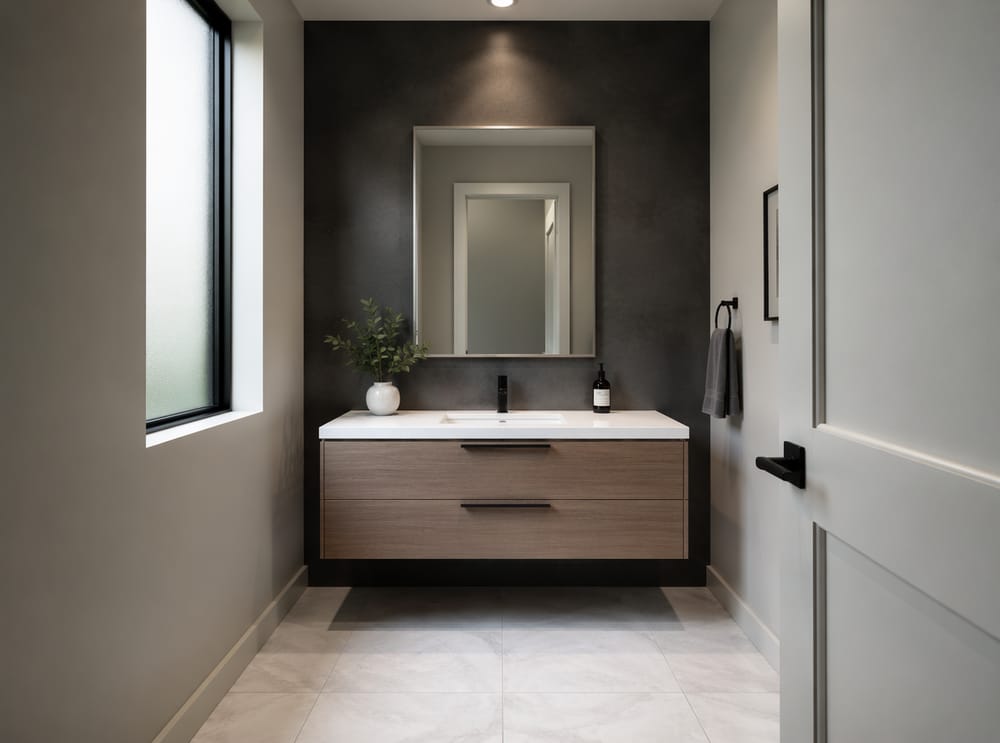 Floating vanity anchored to charcoal plaster wall
